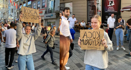 Belaruslu gənc qadın Taksimi "ər axtarıram" plakatı ilə gəzdi - VİDEO